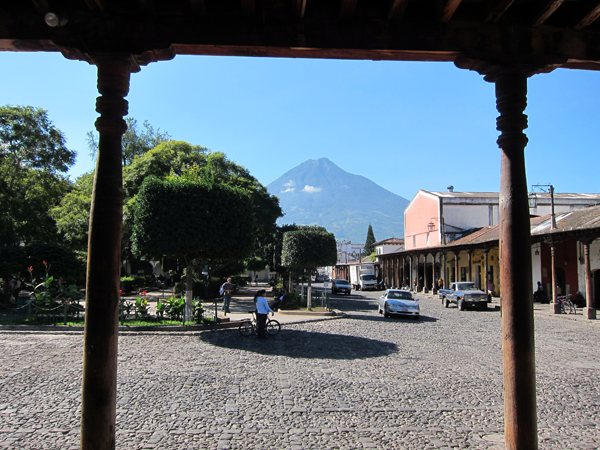 The View of Central Park in Antigua, Guatemala with Volcán de Agua in the background