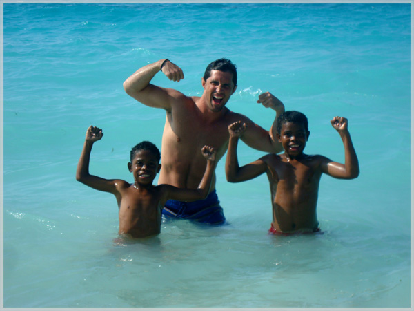 Flexing with locals at Playa Blanca off the coast of Cartagena, Colombia